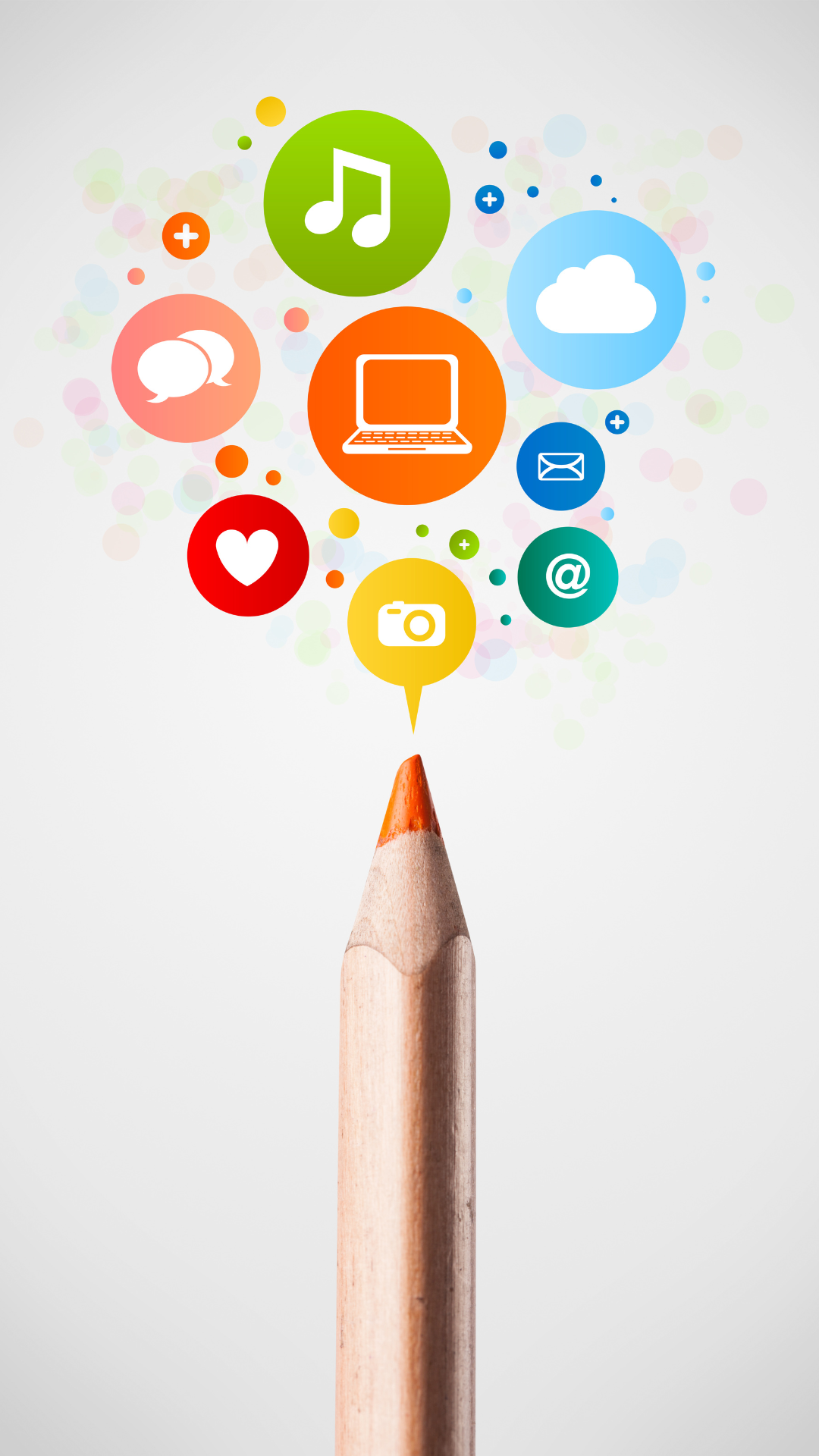 image d'une crayon de couleur avec à sa pointe des icones de musique, ordinateur, cœur, message...